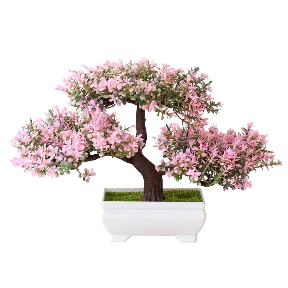 Artificial plastic flower bouquet in bonsai potted plant style with pink and white blooms