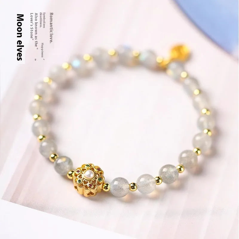 Hand-woven gray moonstone crystal bracelet with sunstone and strawberry quartz 6mm beads showing sun moon elements