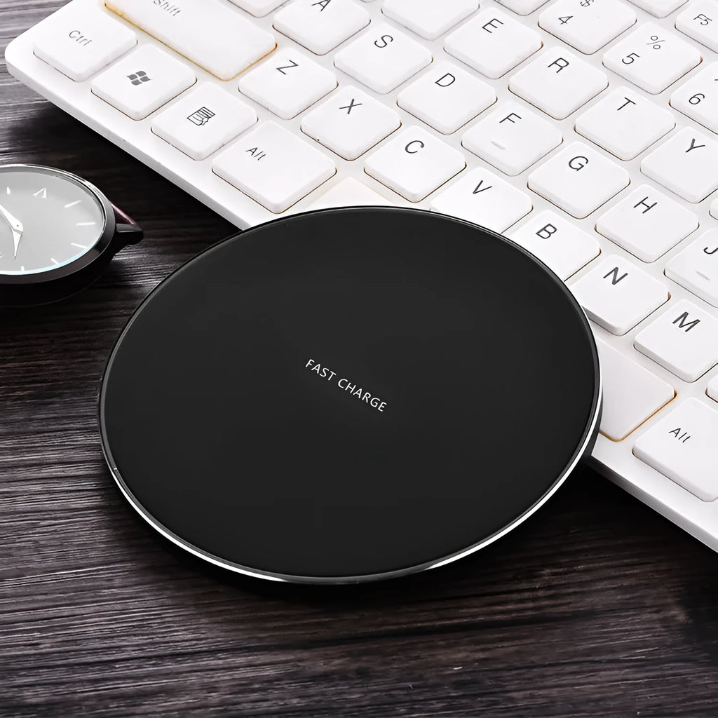Ultra-thin square wireless charging pad in black, red, white, or yellow colour on a desk.
