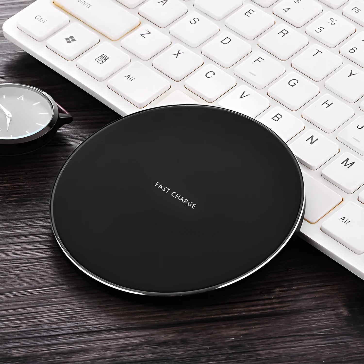 Ultra-thin square wireless charging pad in black, red, white, or yellow colour on a desk.