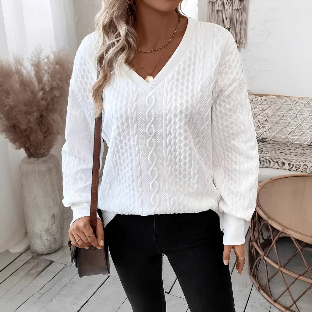 Woman's loose fit milky white long sleeve T-shirt with 3D pattern detail