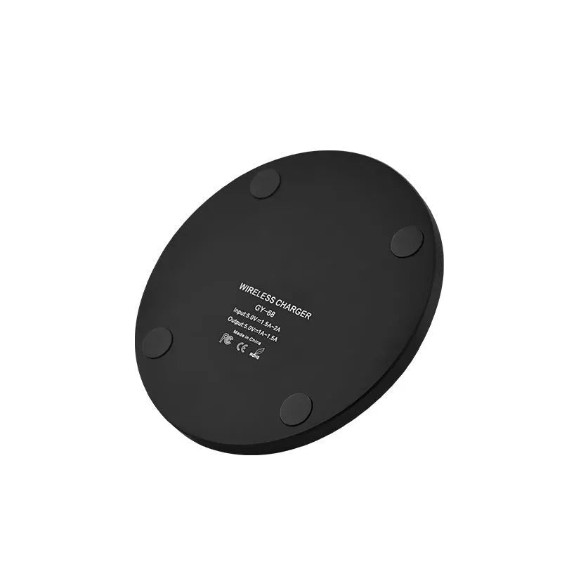 Ultra-thin square wireless charging pad in black, red, white, or yellow colour on a desk.