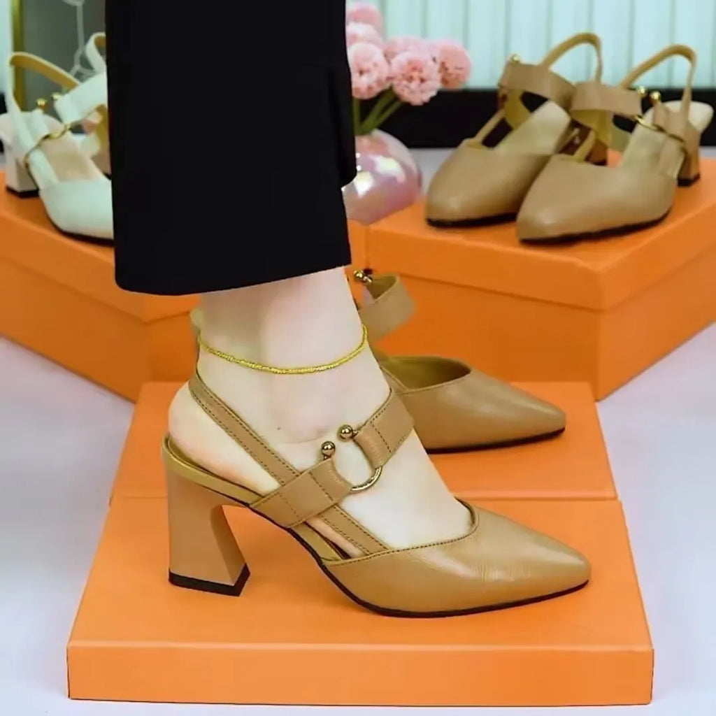 Women's apricot-colour leather sandals with a closed toe, open back, and a chunky high heel.