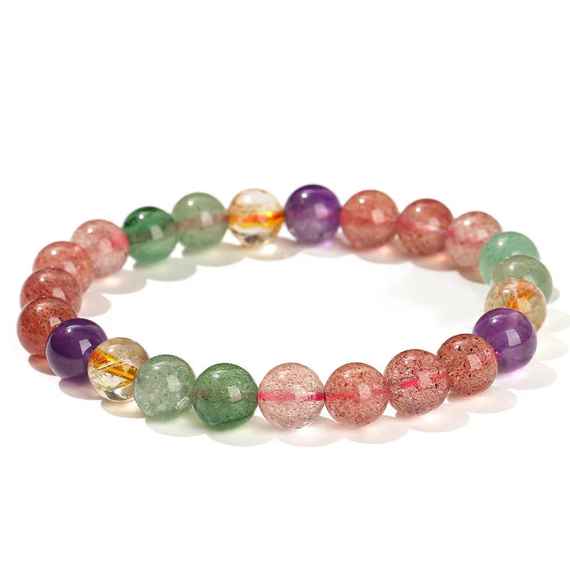 Natural strawberry quartz gemstone bracelet with round geometric beads.