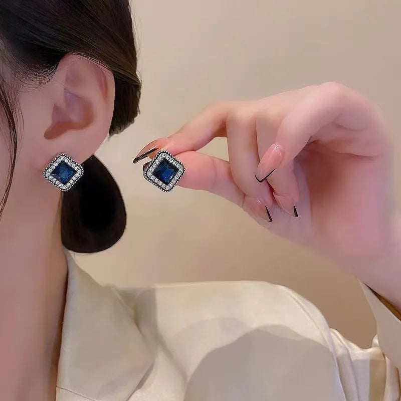 Close up of Korean blue diamond square earrings with geometric zinc alloy design for women