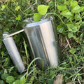 Silver stainless steel dumbbell cup with a cast iron core, shown as a single 8kg unit for weight plate loading.