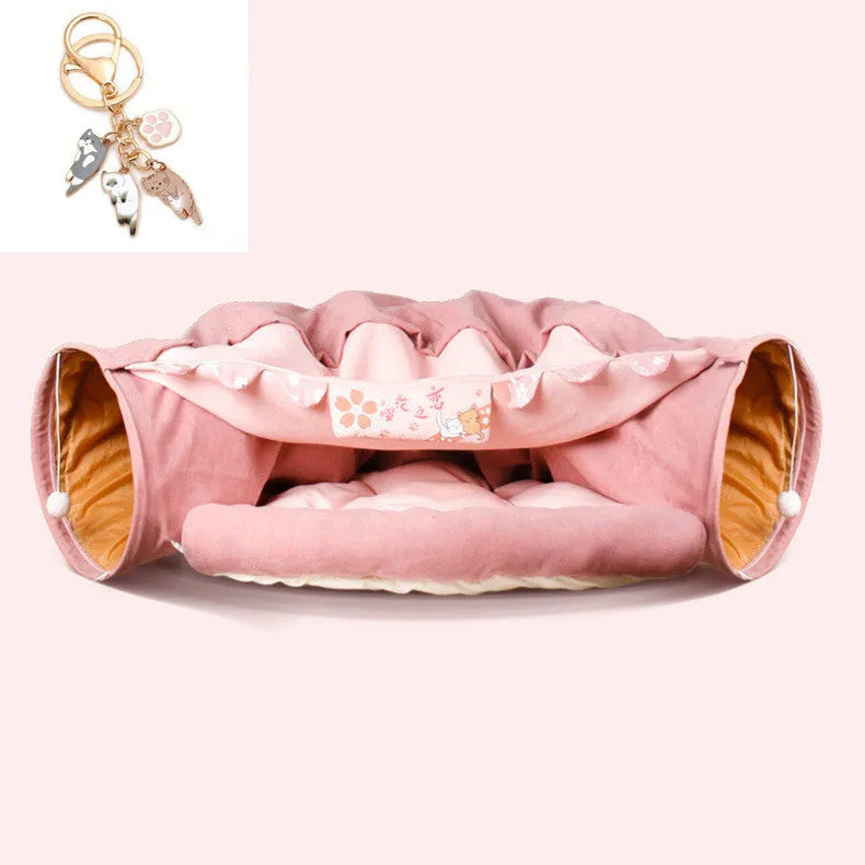 Collapsible cloth cat tunnel folded and unfolded, showing bar design pattern.