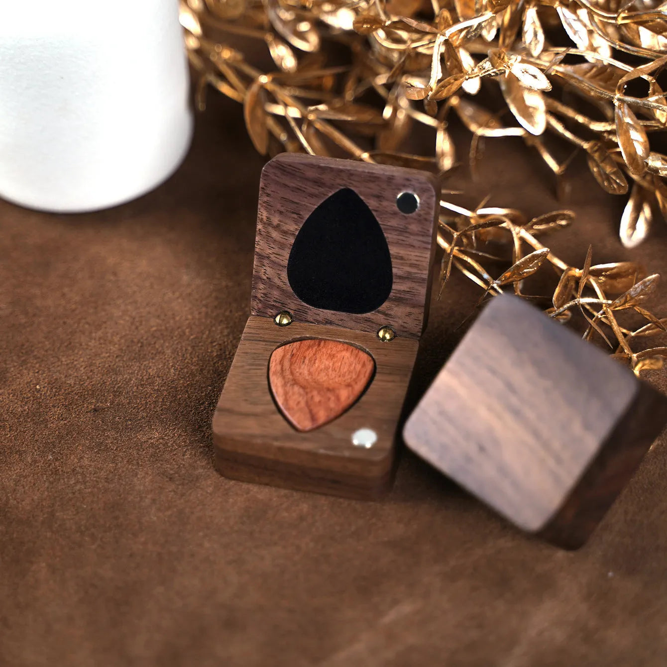 Wooden guitar pick box storage container made from Sapele wood with a brown finish