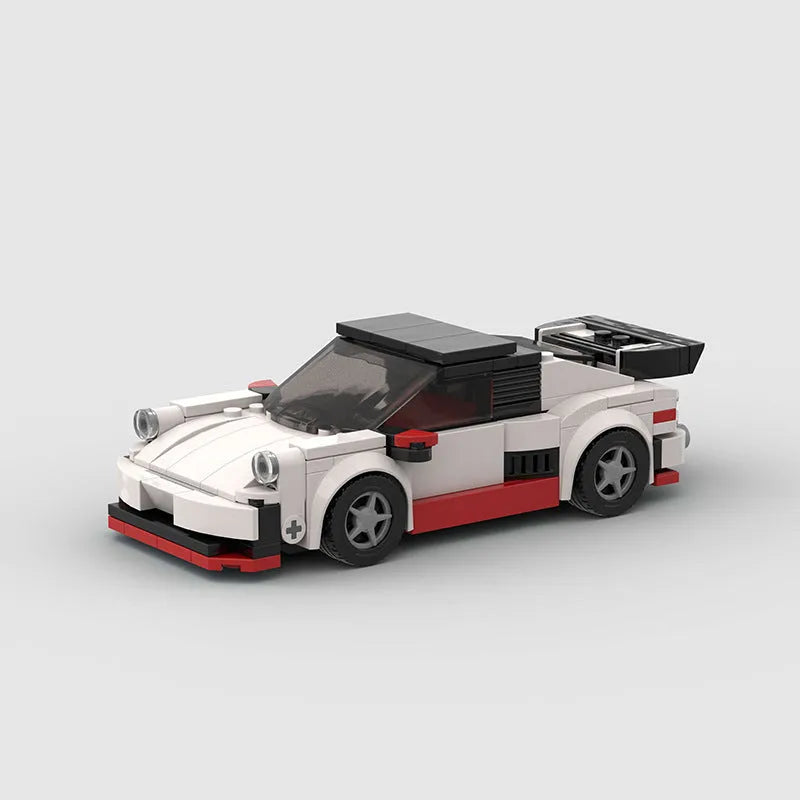 Small particle plastic building blocks model of a cool convertible sports car on a table
