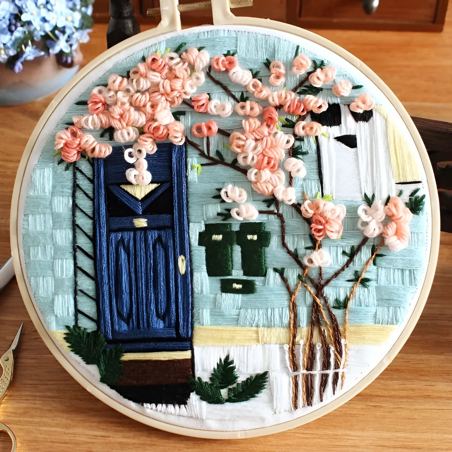 Handmade embroidery material package with cotton sail cloth, needles, and thread for stitching