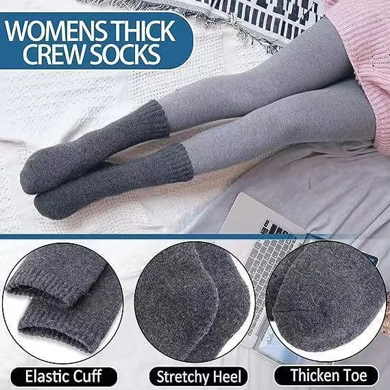 A pair of solid colour wool cashmere blend tube socks with a mid-calf length on a neutral background.