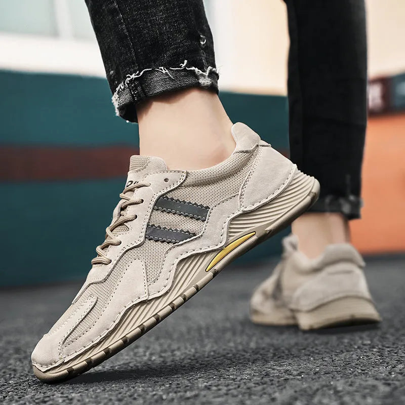 Men's sand-coloured low-top lace-up hiking boots with a pigskin upper and platform rubber sole.