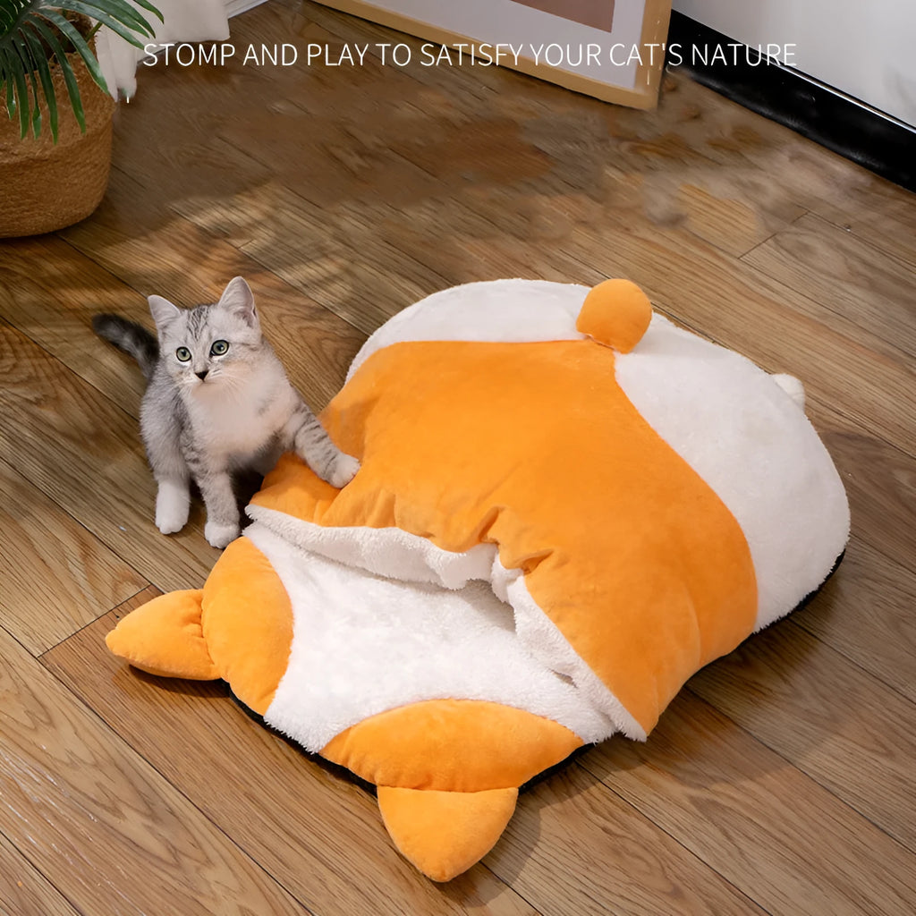 Orange semi-closed cat sleeping bag nest bed on a floor