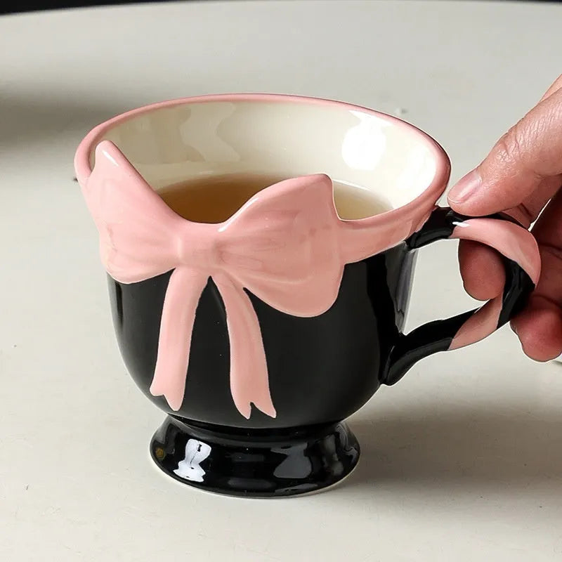 Original heart bow design ceramic mug in black pink or white powder colour, 350ml capacity.