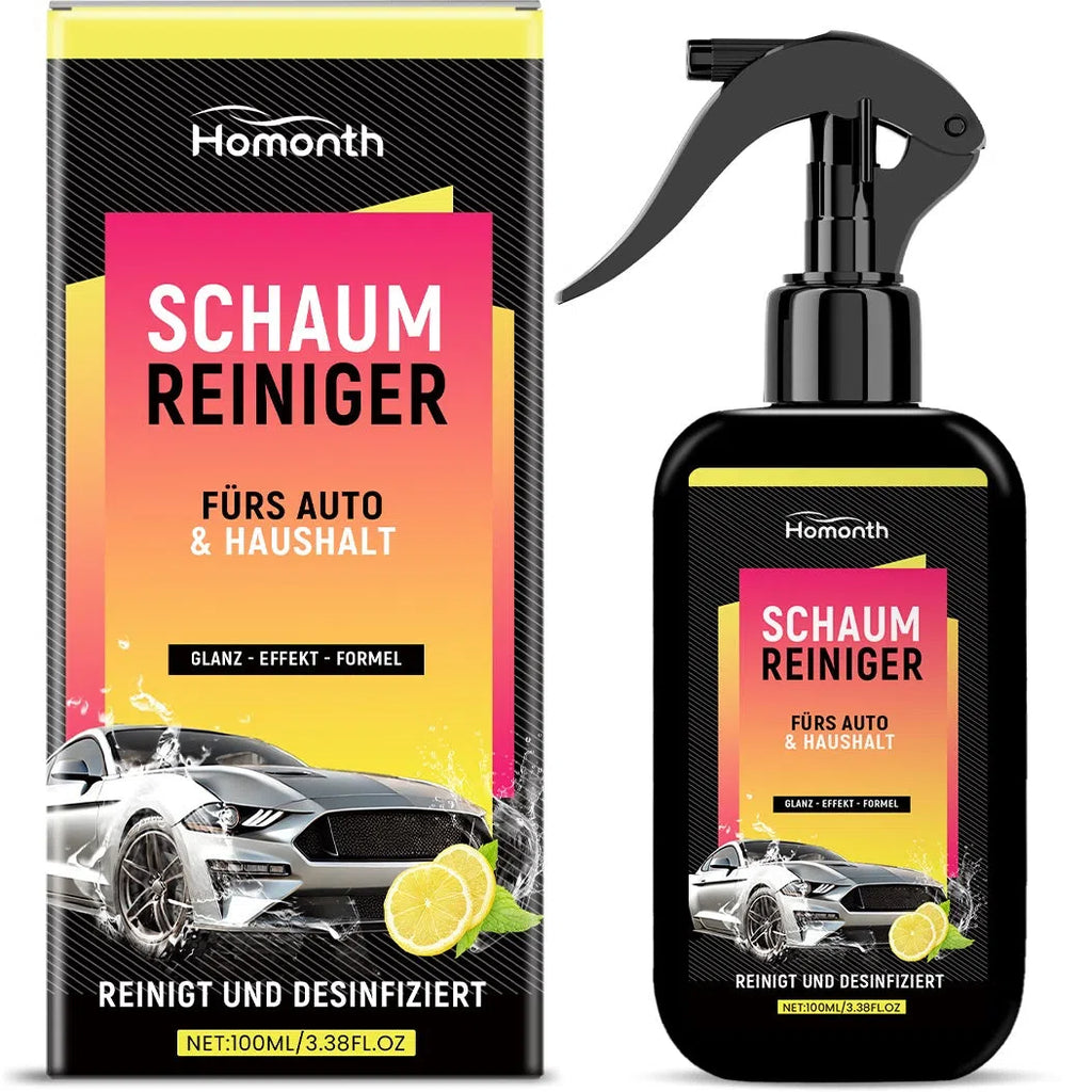 Foam cleaner spray bottle with microfiber towel and cleaning sponge on a table