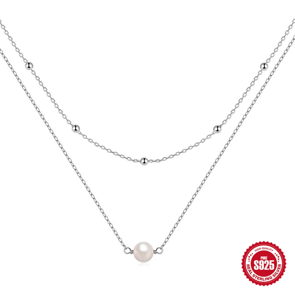 Women's sterling silver double layer twin pearl necklace with a ball bead chain in gold colour.