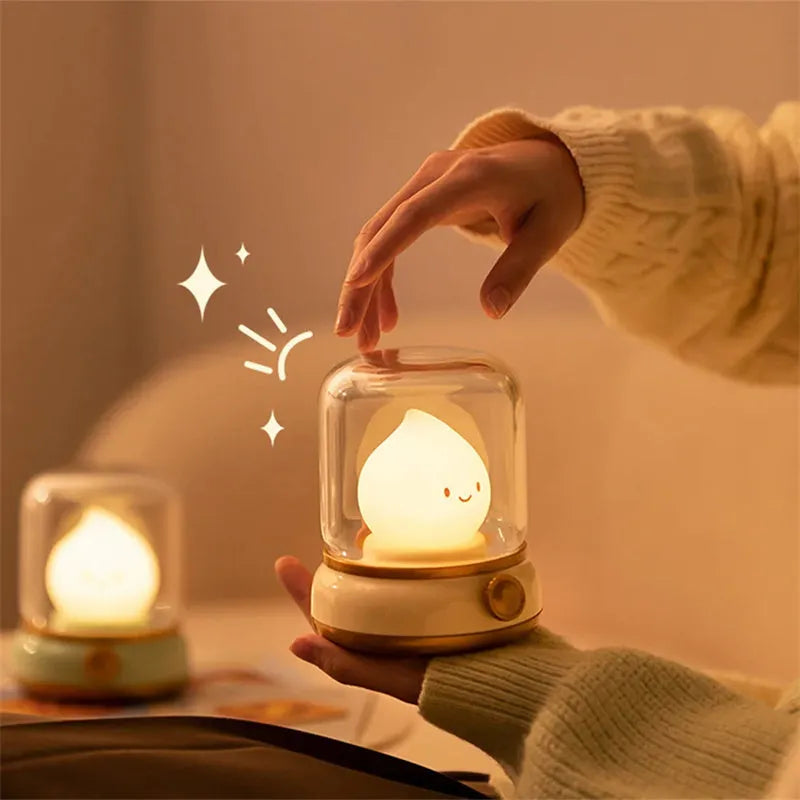 Green retro-style USB rechargeable LED night lamp with dimmer knob on wooden table