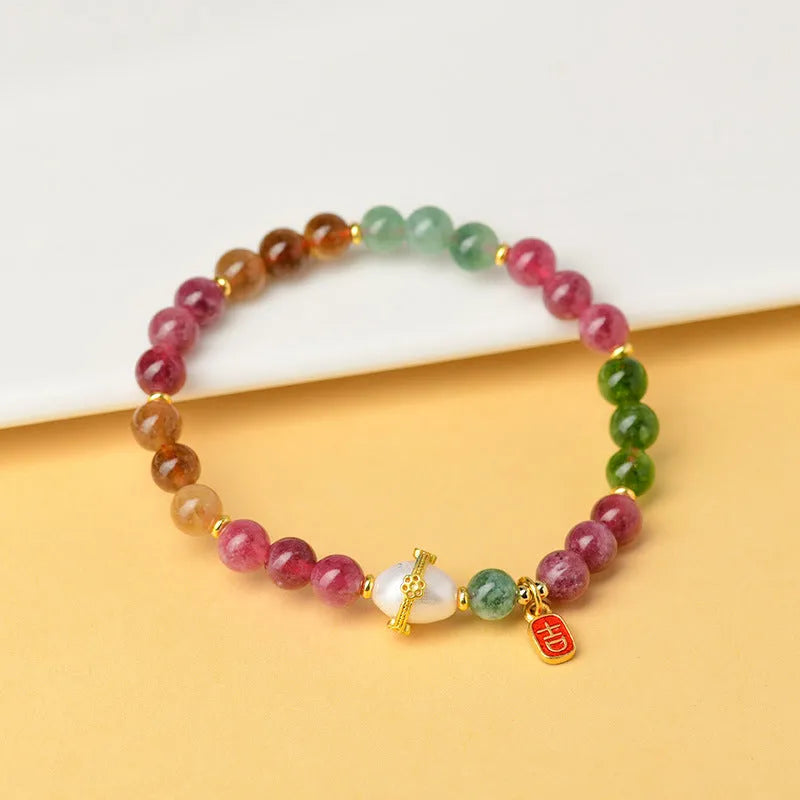 Geometric optimised tourmaline bracelet with 6.5mm chalcedony beads in natural crystal