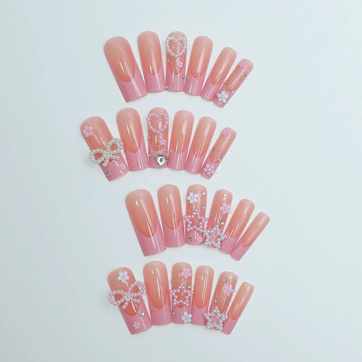 Super long water pipe false nails with love pattern, French spots, and bow drill decorations in colour XB-70-48.