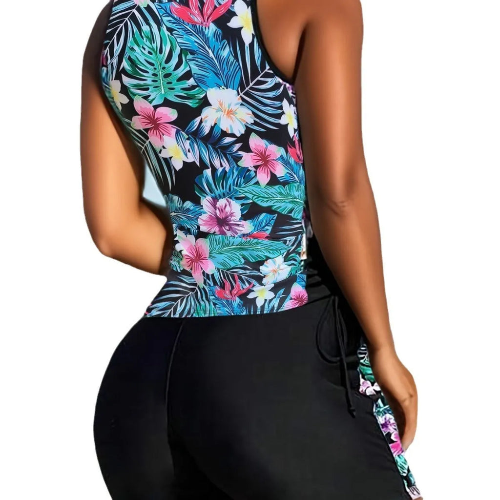 Plus size women's floral print high-waisted bikini for swimming in navy blue, black, green, and blue colours