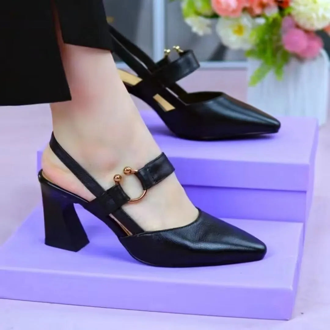 Women's apricot-colour leather sandals with a closed toe, open back, and a chunky high heel.