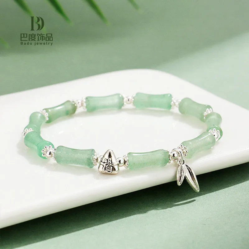 Green aventurine bamboo strawberry crystal bracelet with electroplated finish on adjustable elastic cord