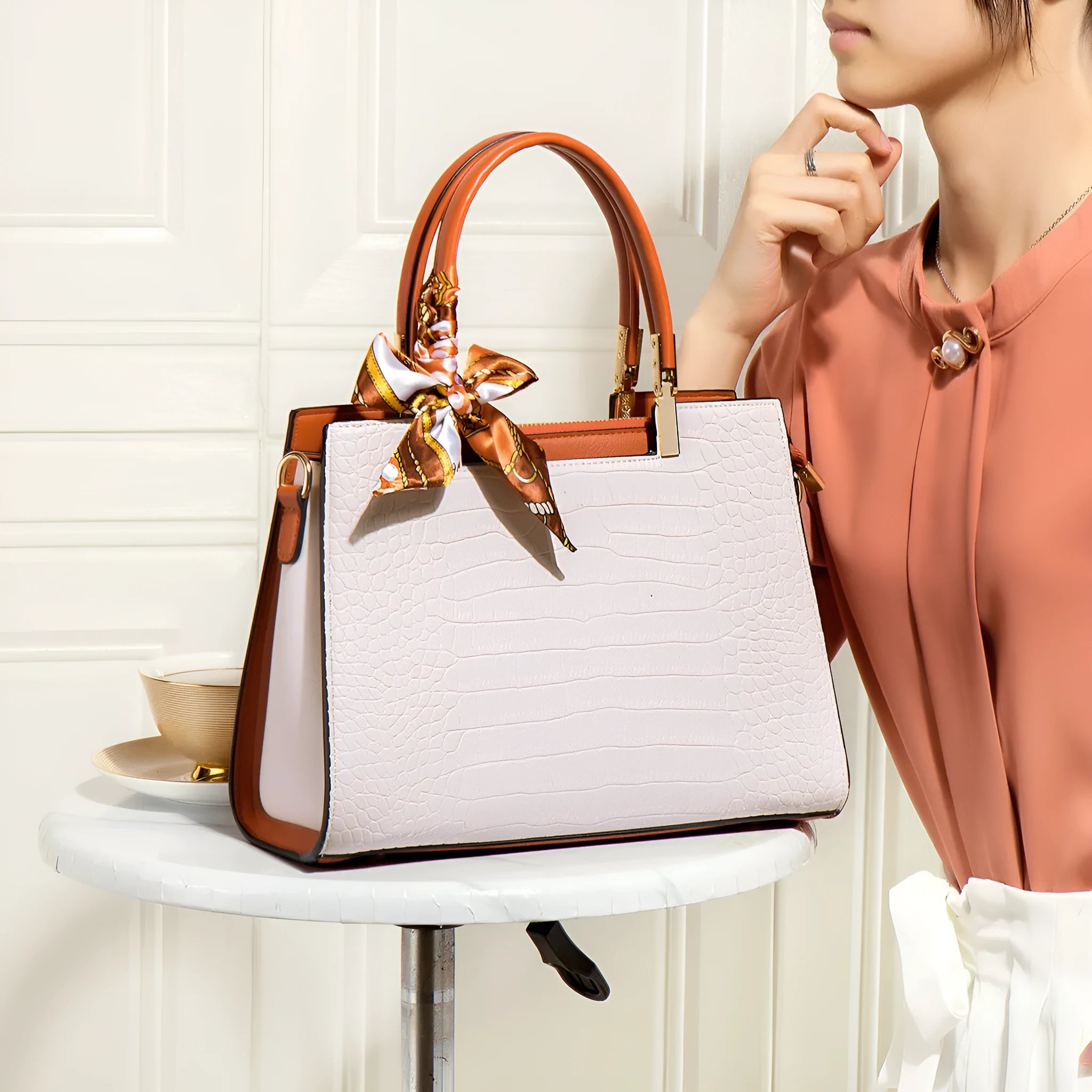 Milky white women's square shoulder handbag made from PU leather, showing slit pocket and clean sewing lines.