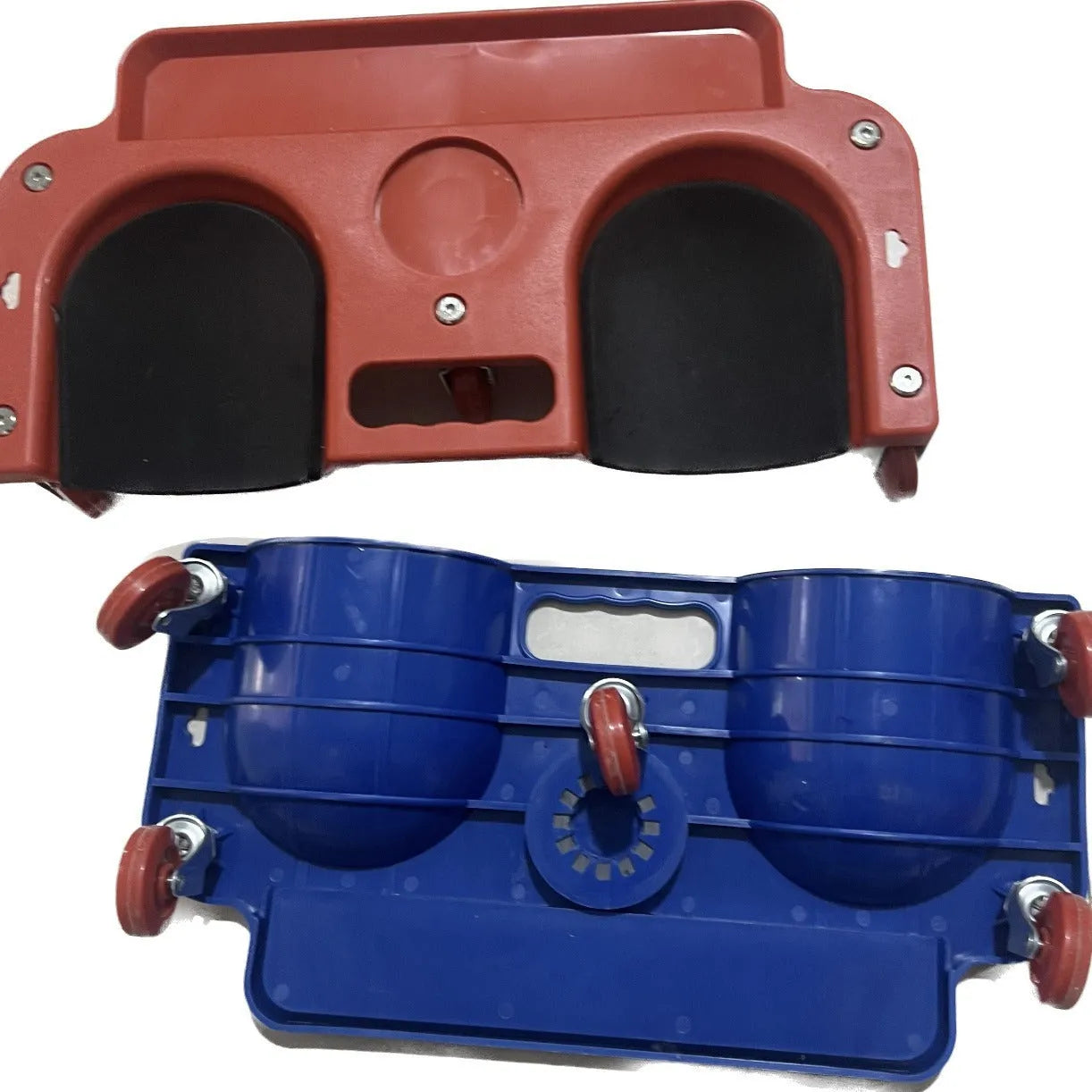 Blue car repair knee board with universal wheels and built-in knee pad on concrete garage floor