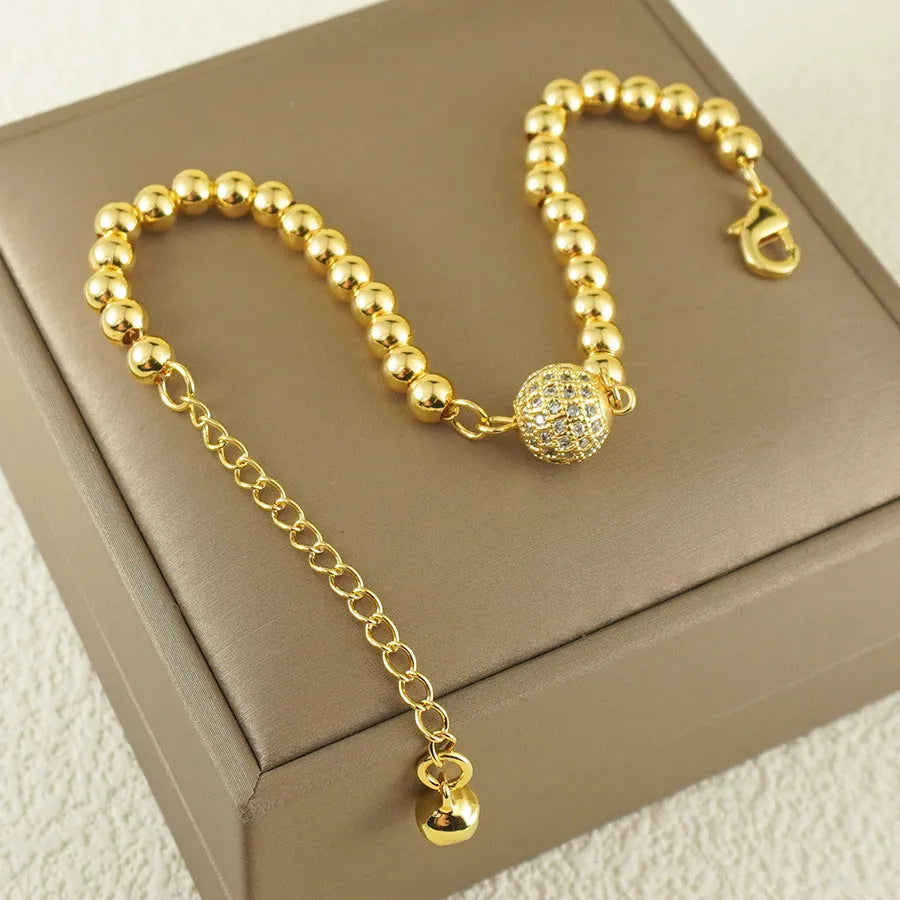 Copper heart-shaped bracelet with a single zircon stone in an Arabic style.