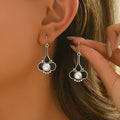 Creative retro-style silver alloy earrings for women with an electroplated finish.