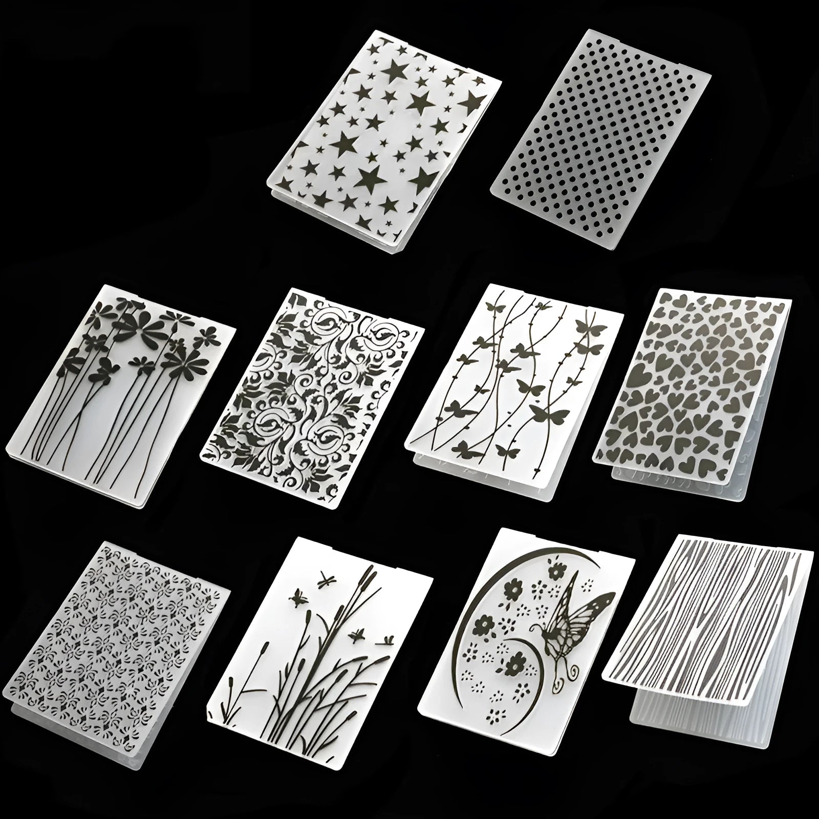 Set of 10 plastic cake decorative moulds showing windmill, star, butterfly, flower, arrow, love, bark flower, polka dot and dragonfly designs