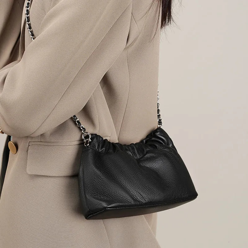 Women's genuine leather dumpling-shaped crossbody bag in black with single shoulder strap
