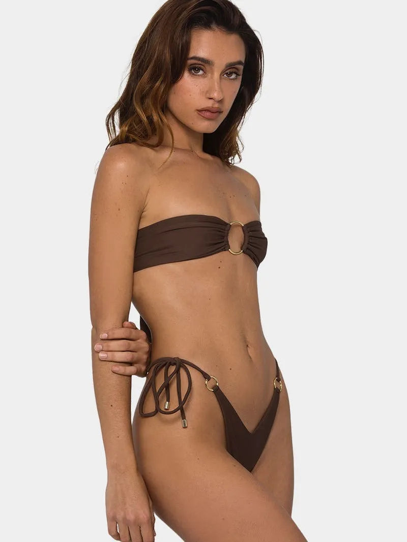 Brown women's tube-top push-up bikini with ring tether detailing on a solid background.