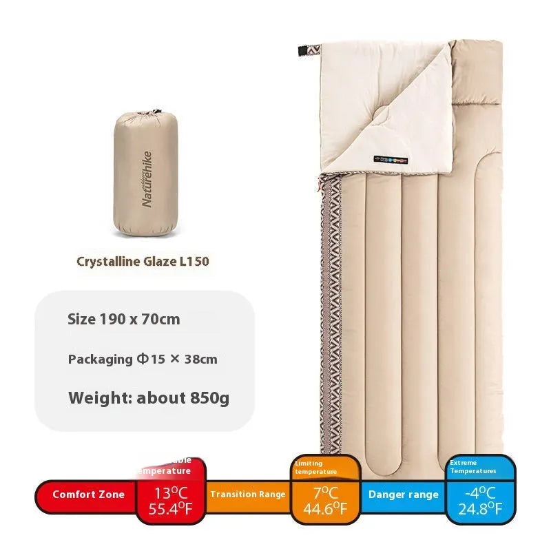 Portable outdoor sleeping bag in one of three colours, shown with its storage bag.