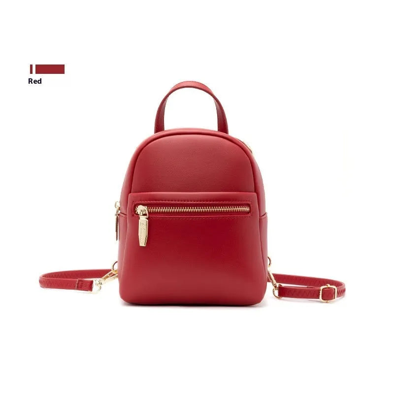 Soft PU mini backpack in street fashion design with contrast colour detailing and interior compartments