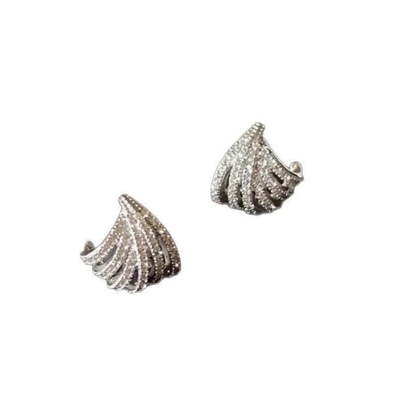 A pair of platinum-coloured geometric line design zircon earrings.