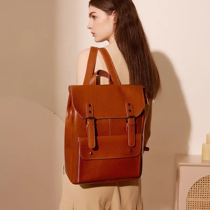 Genuine leather women's computer backpack in black, brown, or coffee brown colours.