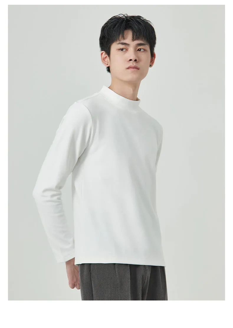 Men's solid colour half-high collar long sleeve t-shirt in Dralon fabric on a hanger.
