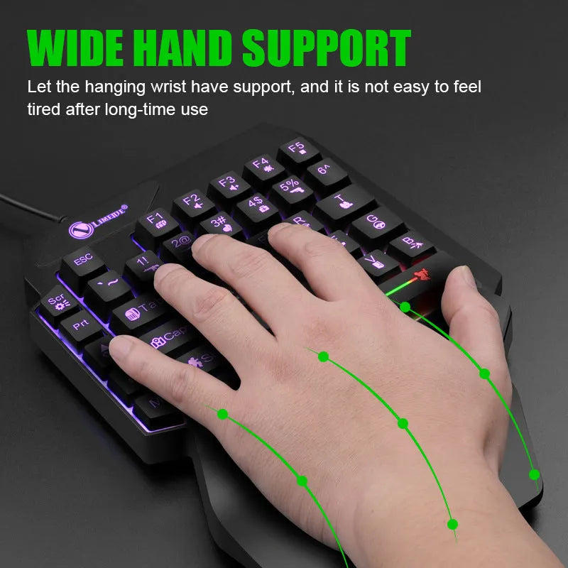 GK103S one-handed luminous mechanical gaming keyboard with backlit keys on a desk.