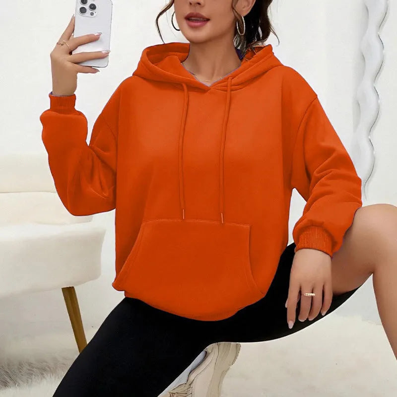Women's loose fit drawstring pocket sweatshirt in various colours with long sleeves