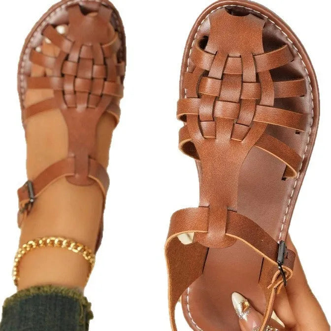 Dark brown women's vintage weave roman sandals with closed toe and buckle fastening on a soft rubber sole.