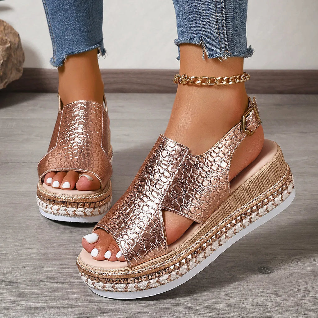 Gold women's Roman sandals with round toe, hollow-out design, and adjustable ankle buckle