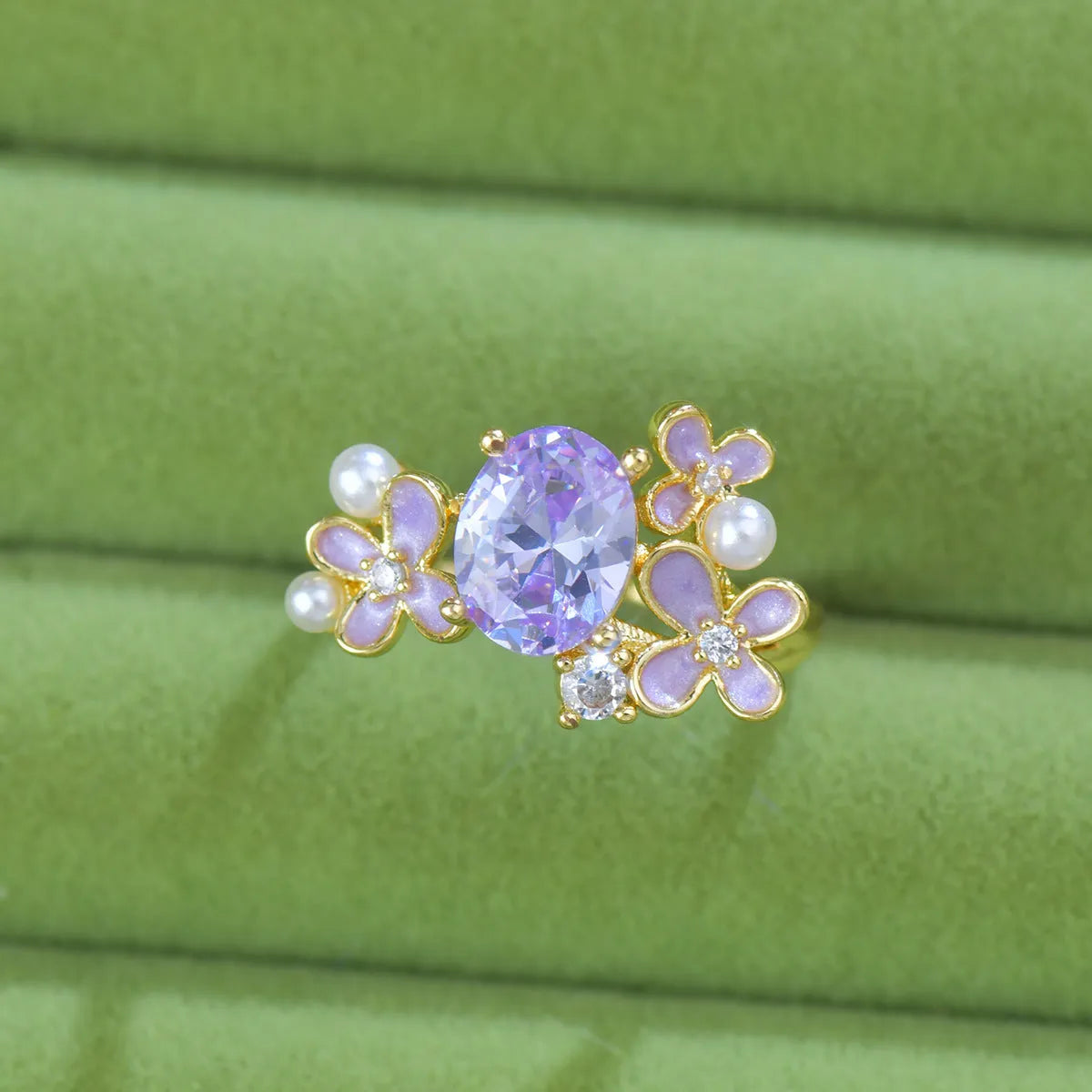 Women's open ring with floral zircon stones in light purple electroplated metal