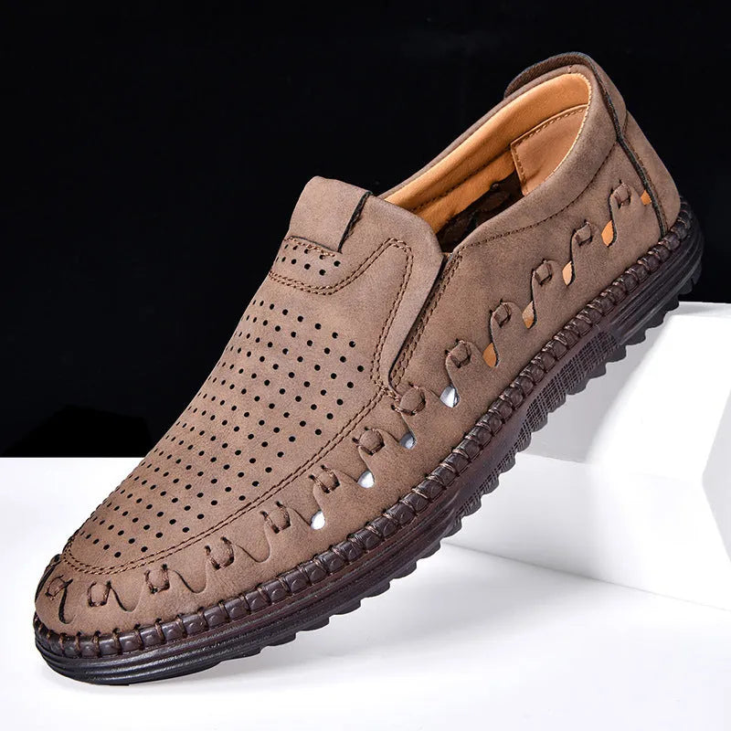 Men's brown casual slip-on shoes with round toe and low-top design showing sewing line details on PVC sole