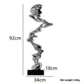 Abstract minimalist resin ornament in metallic colours for modern interior decoration