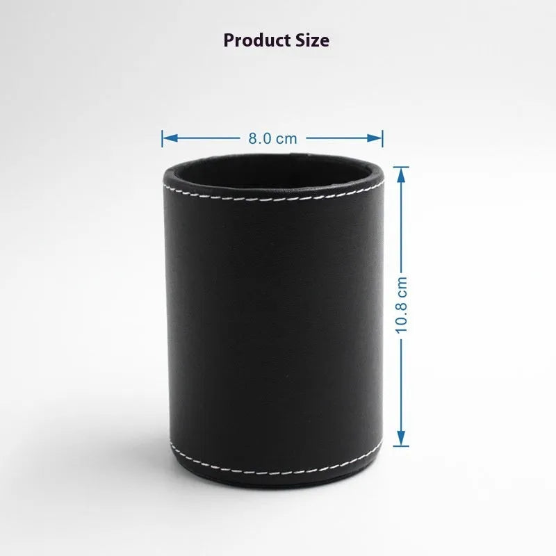 Small round black leather pen holder container showing cylindrical shape and compact dimensions