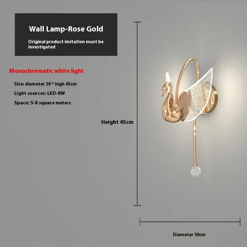 Gold minimalist swan silhouette wall lamp with acrylic shade and dimmable LED light.