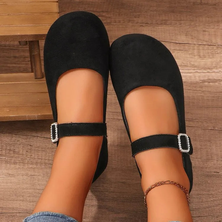 Black canvas women's flat fisherman shoes with low-top design and rubber soles