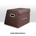 Folding waterproof leather car trunk storage organiser in black medium size on a boot floor