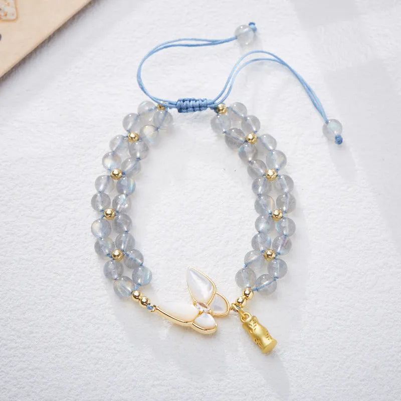 Women's aquamarine butterfly woven bracelet with retro style and handmade construction